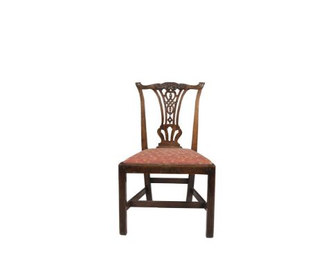  A GEORGE III MAHOGANY CHAIR IN THE CHIPPENDALE TASTE, with pierced splat back, drop-in seat and raised on square legs & 'H' 