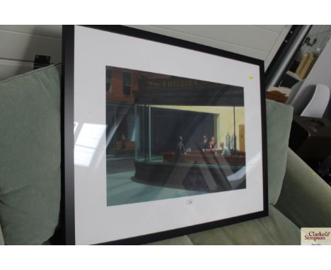 A framed coloured print after Edward Hopper
