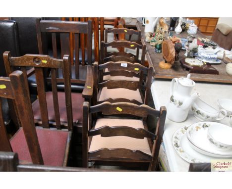 Four oak ladder back dining chairs