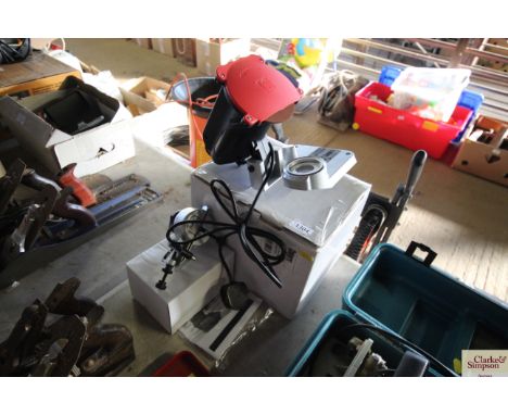 An electric chain sharpener
