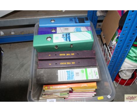 A box containing "On The Road" magazines; Haynes manual; Ordnance Survey maps etc