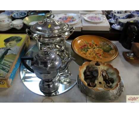 A large silver plated tureen and cover from The Grand Hotel Ipswich; a pair of silver candle sticks AF; a cruet set; a silver