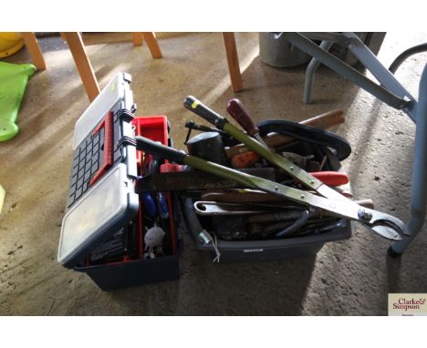 A tool box and tools and another pail of tools