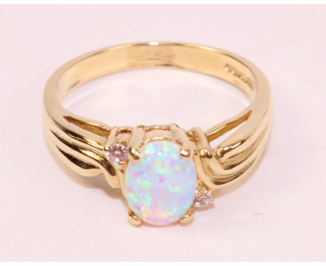 Fancy set opal gold ring hallmarked 9ct   Condition Report   Click here for further images, condition, auction times & delive