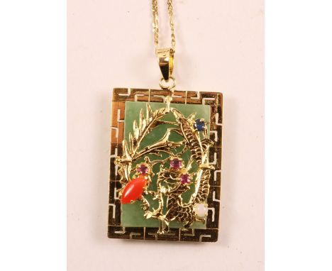 Chinese jade pendant with gold border and gold dragon set with rubies, sapphire, opal and cornelian stamped 18k 750 on fine 9