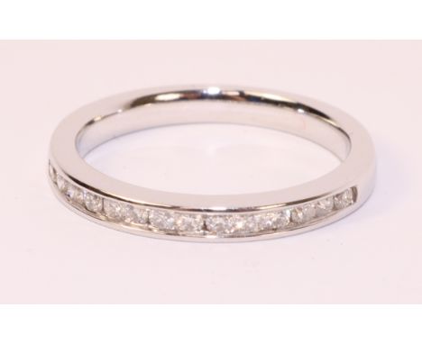 18ct white gold channel set brilliant cut diamond half eternity ring (unmarked)