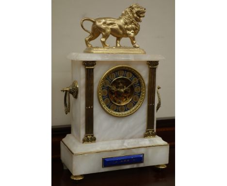 White marble and gilt metal mantel clock, skeleton movement, visible Brocot escapement, standing lion figure, H39cm Condition