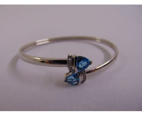 10ct white gold blue topaz and diamond bangle, approx total weight 6.1g