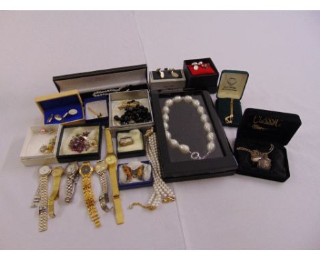 A quantity of costume jewellery to include Christian Dior and ladies wristwatches