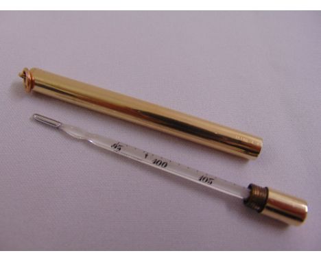 9ct yellow gold cartridge with screw off top to reveal a thermometer