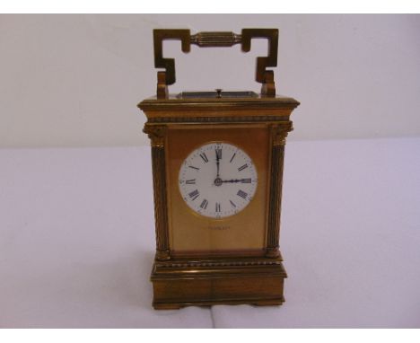D. Schwarck and Son of Leamington brass repeating carriage clock of customary form the enamel dial with Roman numerals