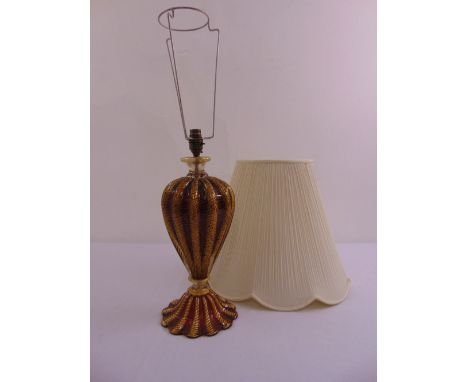 A Murano red glass table lamp with silk shade