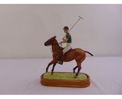 Royal Worcester figurine of The Duke of Edinburgh playing polo with original packaging