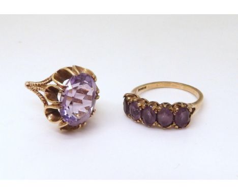 A retro amethyst ring, size N, together with a five stone amethyst ring, size R1/2, weight combined 7.7gms Condition Report:A