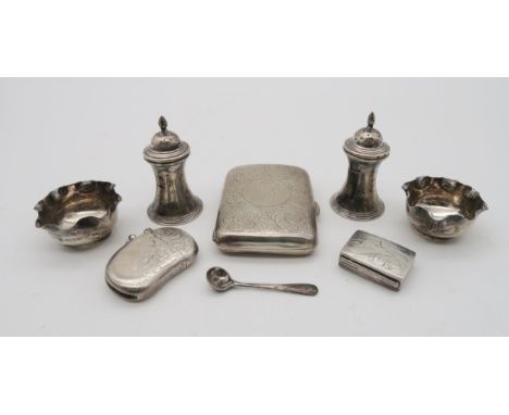 A collection of silver including a silver cigarette case, by William Hair Haseler, Birmingham, with engraved scrolling foliat