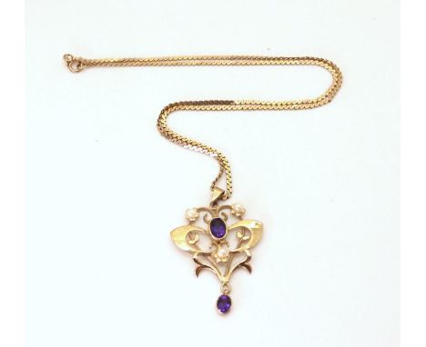 A 9ct gold amethyst and pearl set Edwardian style pendant on a 42cm long snake chain, weight 6.2gms Condition Report:Availabl