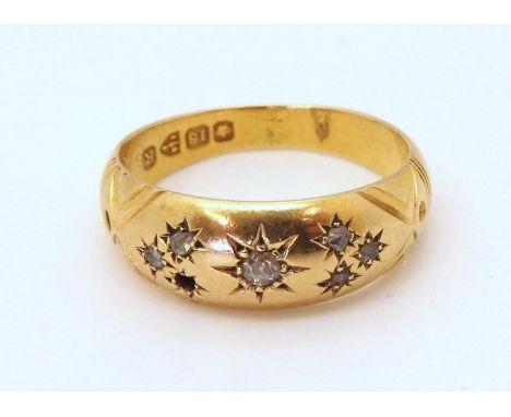 An 18ct gold vintage ring, Chester hallmarks for 1900, size M, (one tiny diamond lacking) weight 2.4gms Condition Report:Avai