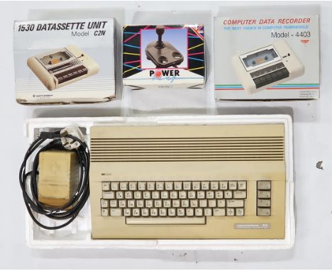 A Commodore 64 Personal Computer, a Model C2N 1530 Datasette Unit, Model 4403 Computer Data Recorder and "Cruiser" Power Play