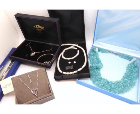 A silver and rose coloured metal Clogau pendant together with a silver mother of pearl inlaid bangle and other items Conditio