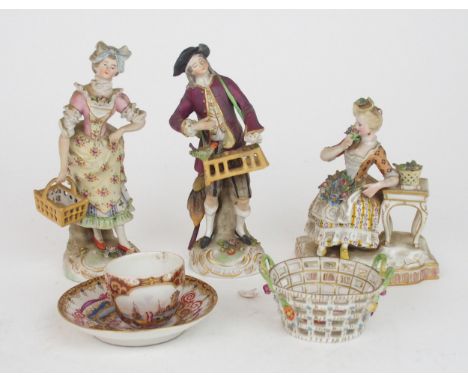 A Meissen cabinet cup and saucer&nbsp;painted with scenes of a port, a Dresden floral basket, a Meissen figure of a woman sme