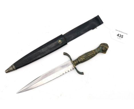 A German hunting knife or small dagger, with cast brass ball and claw handle, the serrated 15.4cm blade marked "Rostfrei" and