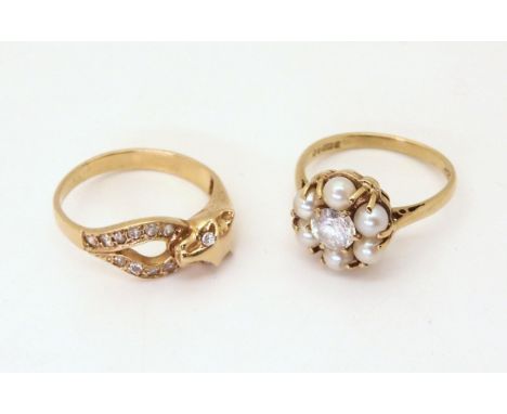 A 9ct gold leopard head ring set with cz, size N, and a 9ct pearl and clear gem flower ring, size N, weight together 5.6gms C