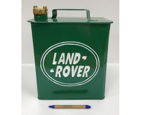 A modern metal petrol style can inscribed "Landrover", 26 cm wide x 16 cm deep x 32 cm high, together with another similar sm