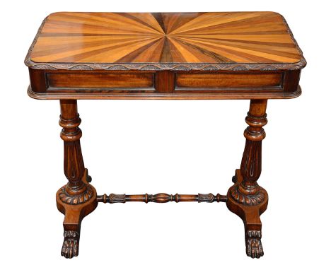 A mid 19th century Anglo-Indian centre table c.1840probably padouk, the top radial veneered in specimen woods with a waved an