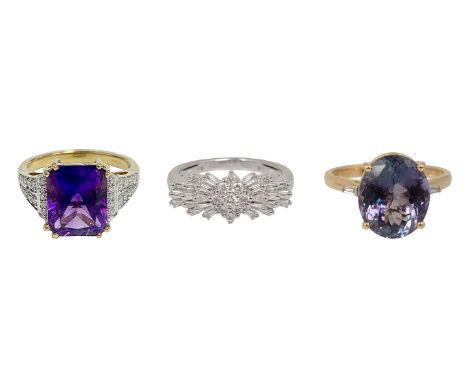 Three gem-set rings:  a tanzanite  stated to weigh 5.80cts,  a tapered baguette-diamond to each shoulder, 14ct yellow gold ha