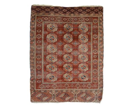 Two Tekke Bokhara rugslate 19th centuryone with more geometric borders and a red field with three rows of guls, the other exa