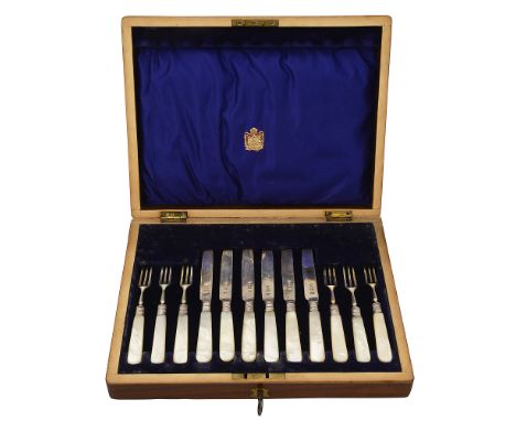 An Edwardian cased set of six mother pearl handled fruit knives and forksSheffield, mostly 1908/1910 by Fenton Brothers, in a