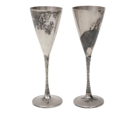 Stuart Devlin (1931-2018) A pair of modern silver and parcel gilt liqueur gobletsLondon, 1982 by Stuart Devlin,plain tapering