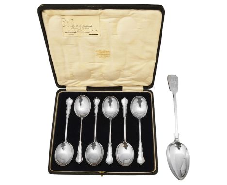 A George V cased set of six silver 'Chippendale pattern soup spoons and an early Victorian fiddle pattern basting spoon first