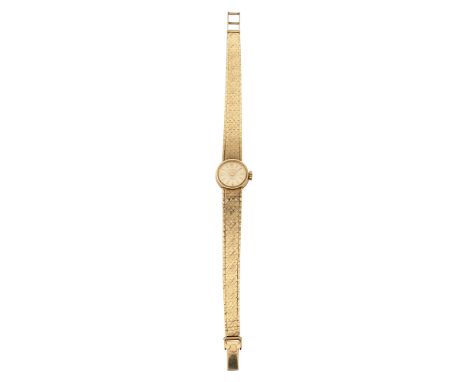 A 1960s lady's 9ct gold Rolex wristwatch circular brushed champagne dial with raised gold hour batons and gold hands signed R