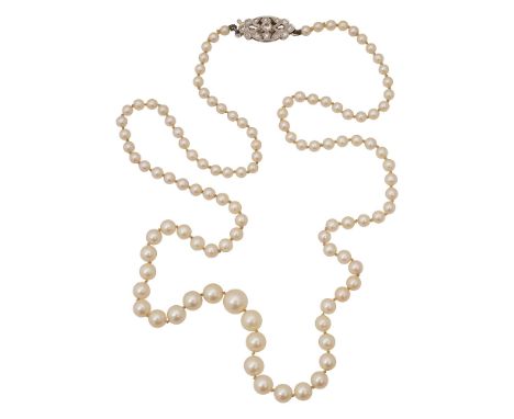A  cultured pearl necklace graduated in size from diameter 7.3mm to 3.2mm, to the oval openwork diamond-set clasp Length 55cm