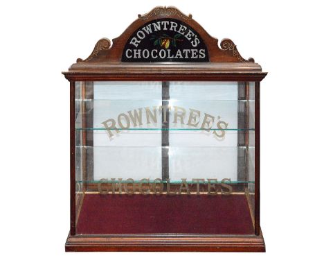 A Rowntree's Chocolate glazed display cabinetlate 19th/early 20th century glazed advertising shop display cabinet, carved ped