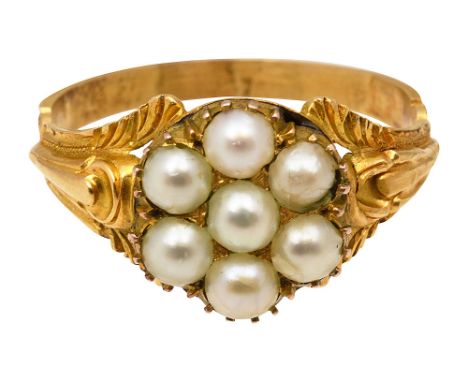 A late Georgian half pearl cluster ring with trifurcated raised tear and feather shoulders and ridged shank, closed back yell