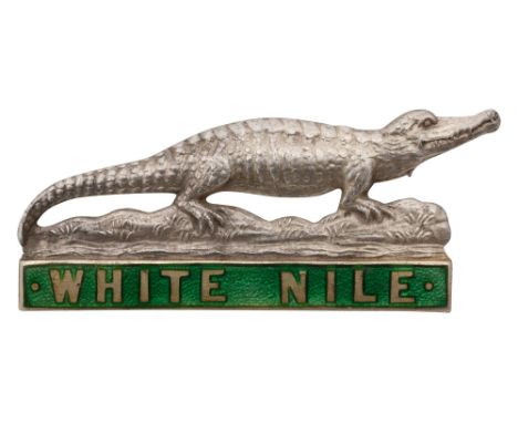 Sudan: White Nile Province silver and enamel cap/ pagri badge dies stamped crocodile over green enamel 'White Nile tablet, ma