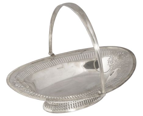 An Edwardian silver pierced swing handled cake basketSheffield, 1904 by Thomas Bradbury and Sonsof plain oval from with gadro