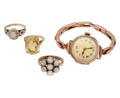 A 9ct gold lady's wristwatch, a 9ct gold opal ring, a 9ct gold moonstone cluster ring and a 9ct gold citrine set ring, (4)cit