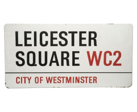 An enamelled iron street sign, Leicester Square WC2 City of Westminsterwith iconic black and red sans serif lettering first c