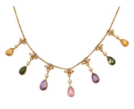 An Edwardian multi gem-set necklacethe front section suspending seven very slightly graduated pendeloque citrine, tourmaline,