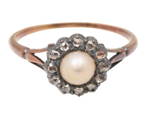 A pearl and diamond-set cluster ringthe central pearl (untested) within a surround of rose-cut diamonds to the trifurcated sh