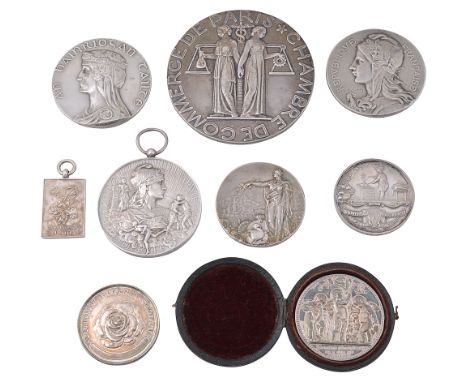 A collection of mostly early 20th century silver prize and commemorative medals comprising Ireland, Free State Tailteann Game