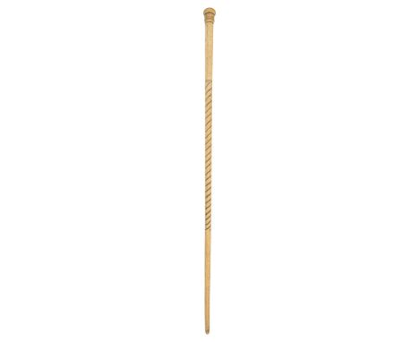 A 19th century sailor's whalebone and marine ivory walking cane part carved spiral fluted stem, pierced to take a cord, screw