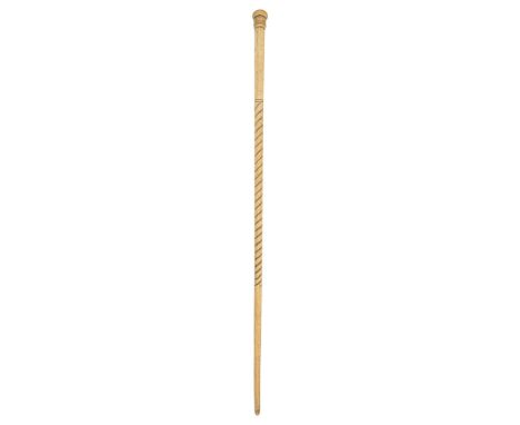 A 19th century sailor's whalebone and marine ivory walking cane part carved spiral fluted stem, pierced to take a cord, screw