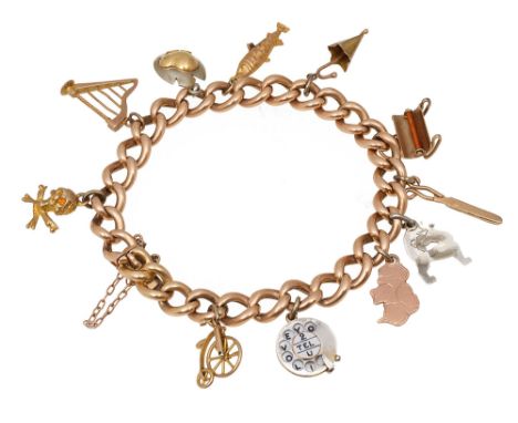 A 15ct curb link charm bracelet with 9ct charmsincluding a 9ct old penny farthing charm, stamped, a rotary telephone charm wi