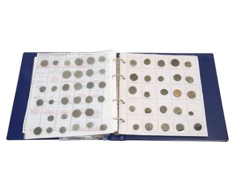 An album of late Roman coins to include Celtic Durotriges "Cranbourne Chase' Silver Stater, mostly AE 3rd/4th century Conditi