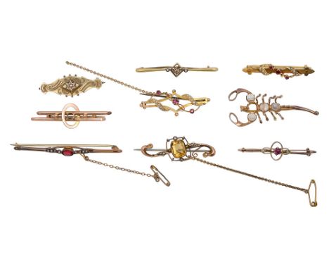 A collection of bar brooches including a 9ct gold citrine and half pearl bar brooch with safety chain stamped '9 .375', a 9ct