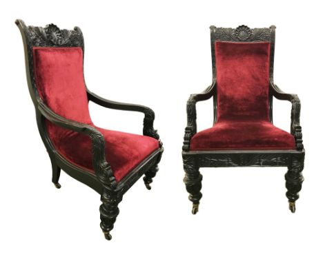 A pair of Anglo Indian ebony armchairsmid 19th century, probably Ceyloneseupholstered in later red velvet, the crestings carv